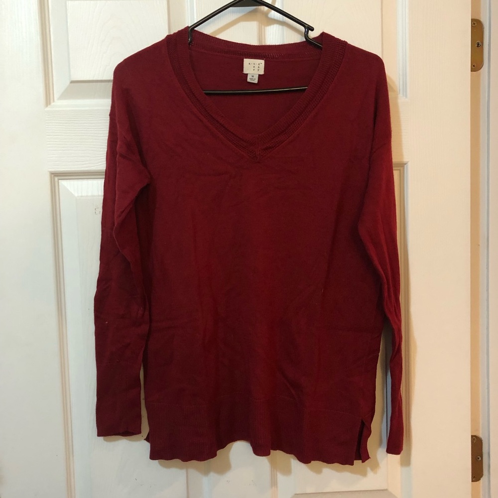 Red v-neck sweater